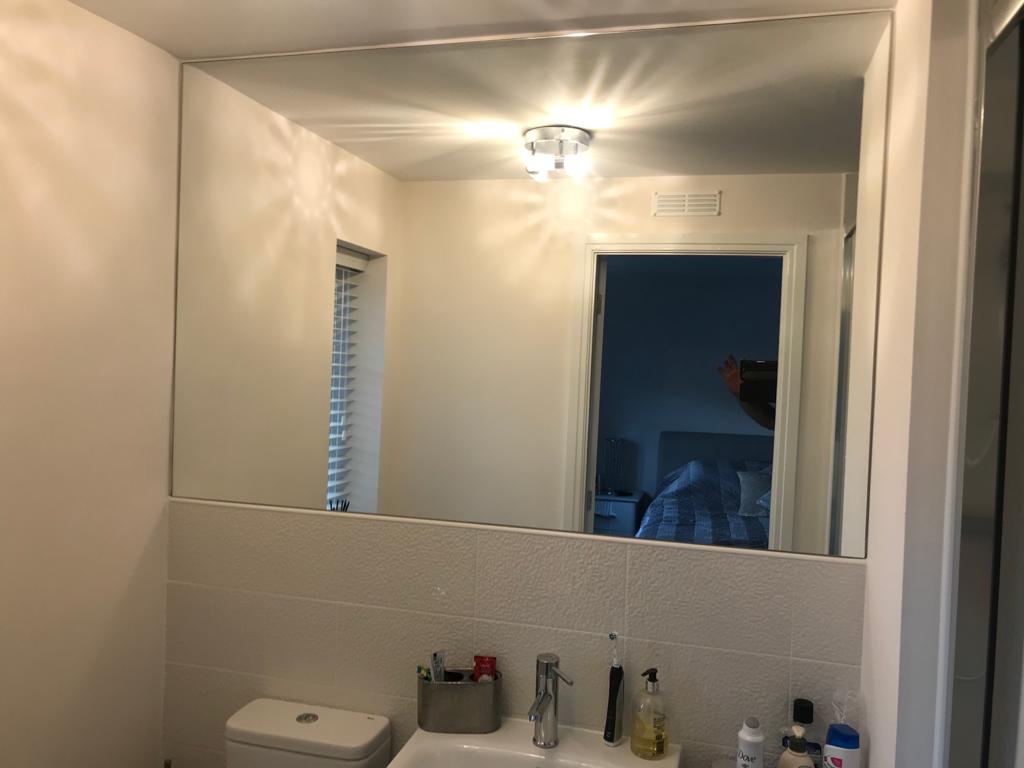 bathroom mirror installation